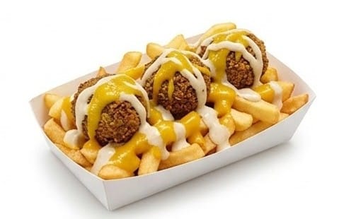 Bagdad-Pommes - Bagdad-Pommes
Große Pommes mit 3 Falafeln, irakischer Amba-Mangosoße und Tahinisauce bei Bella Pizza